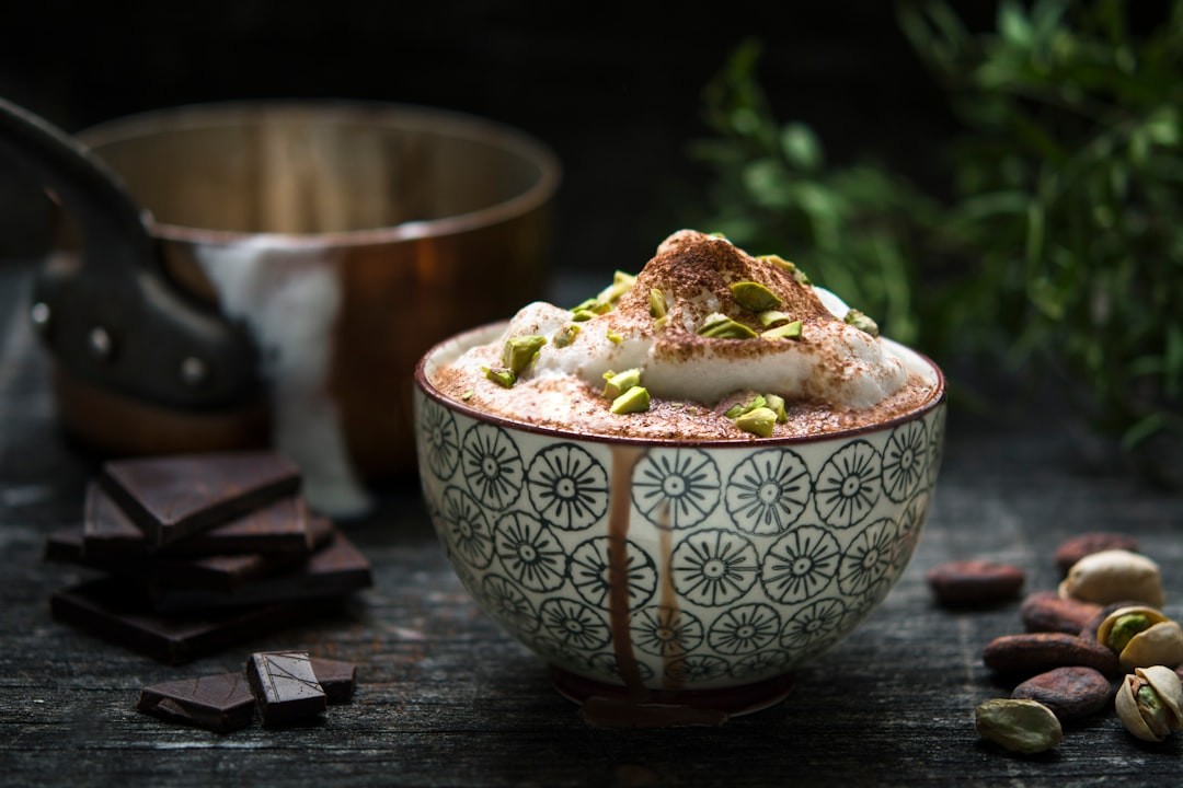 a bowl of ceremonial cacao with froth 